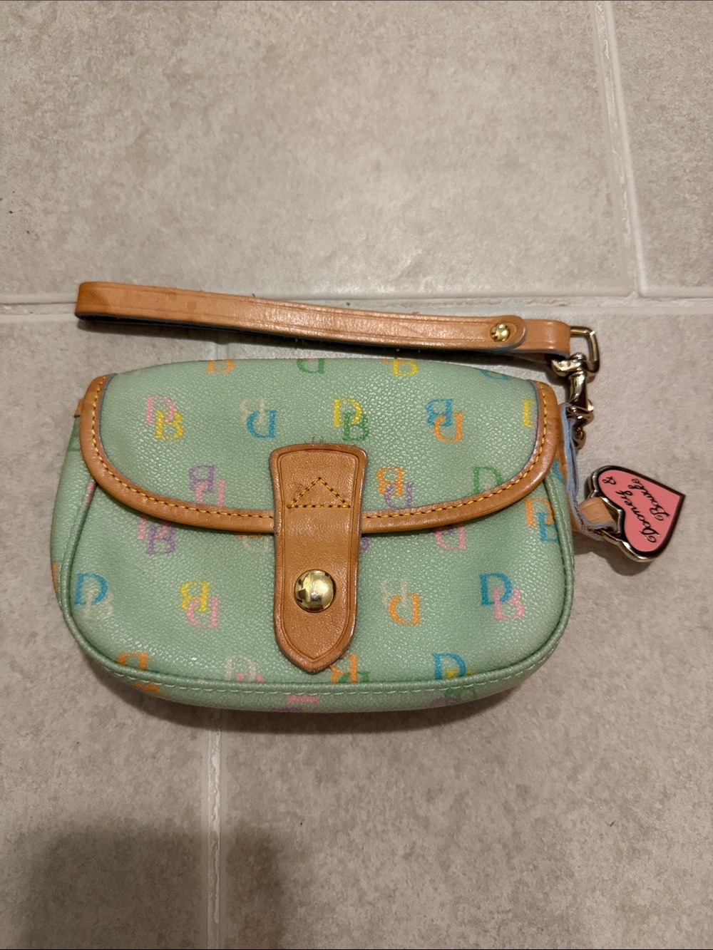 Dooney & Bourke Mint Wristlet with Multicolor Logo and Tan Trim